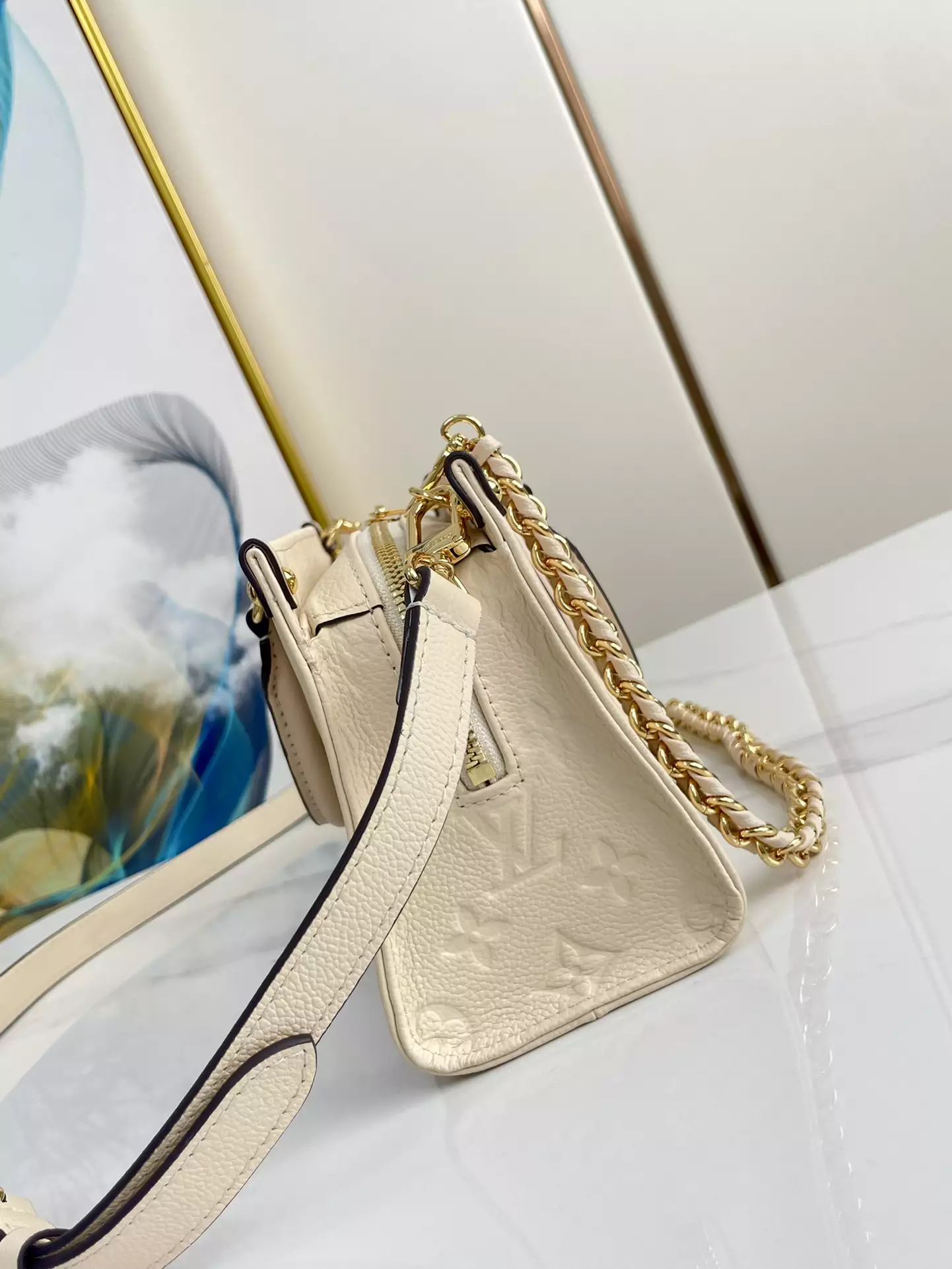 OnTheGo East West Monogram Empreinte Creme Leather - Repbags.ru - Image 5